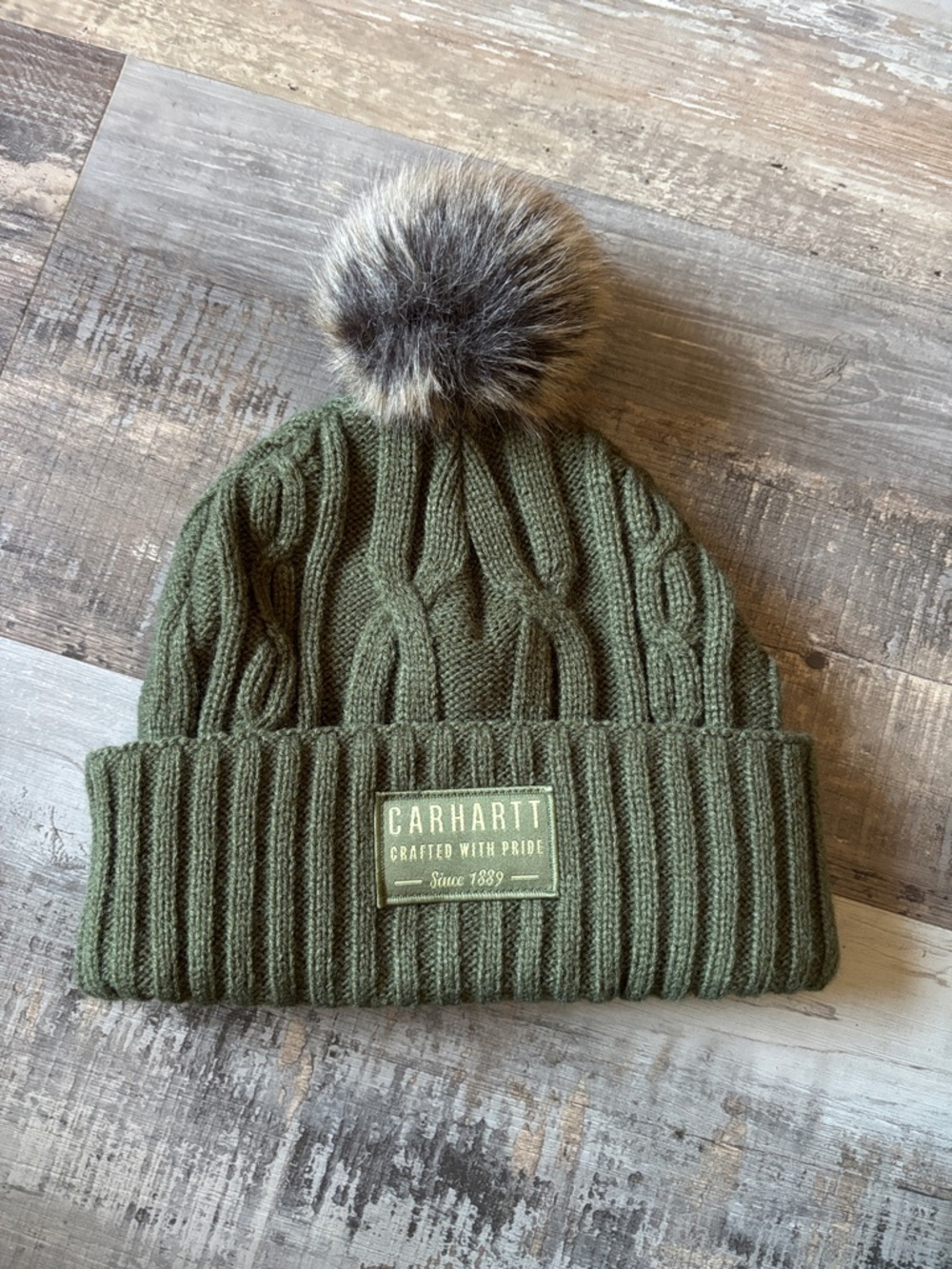 Green Carhartt Beanie with furry Pom Pom